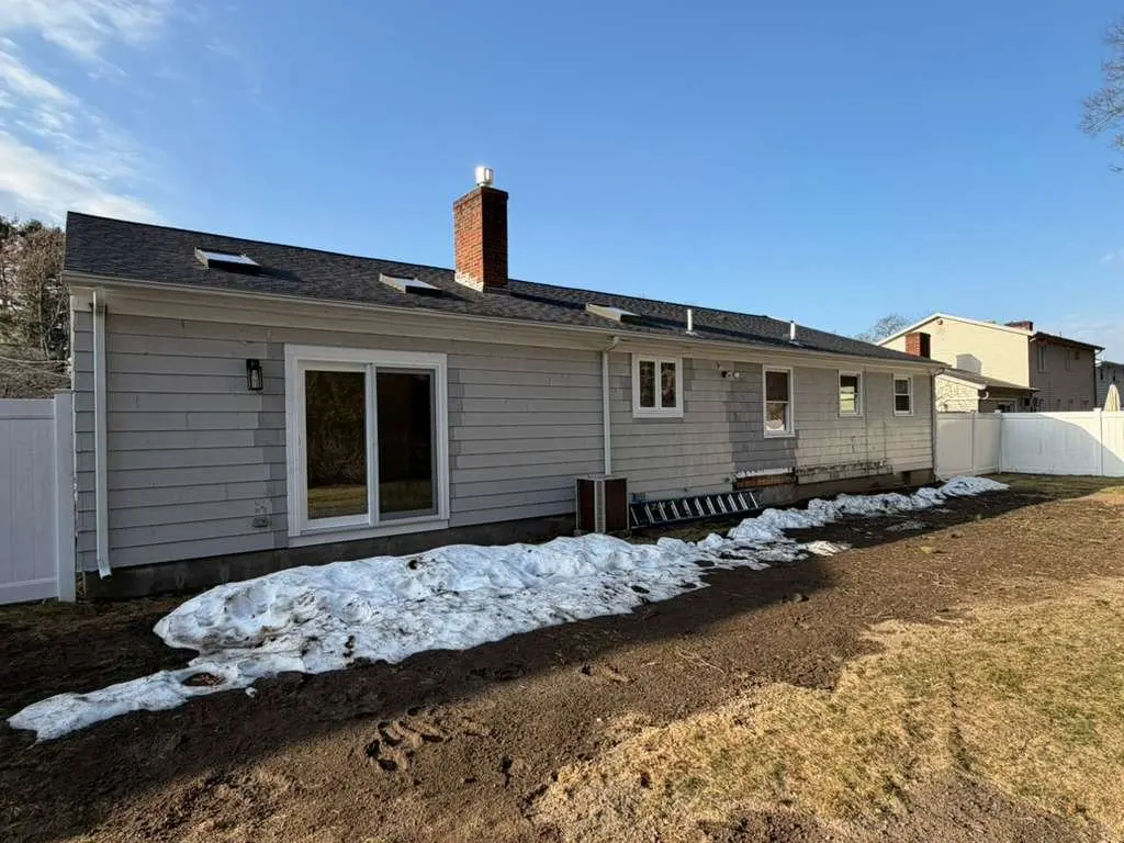House with pale exterior siding from the E&B project photo library